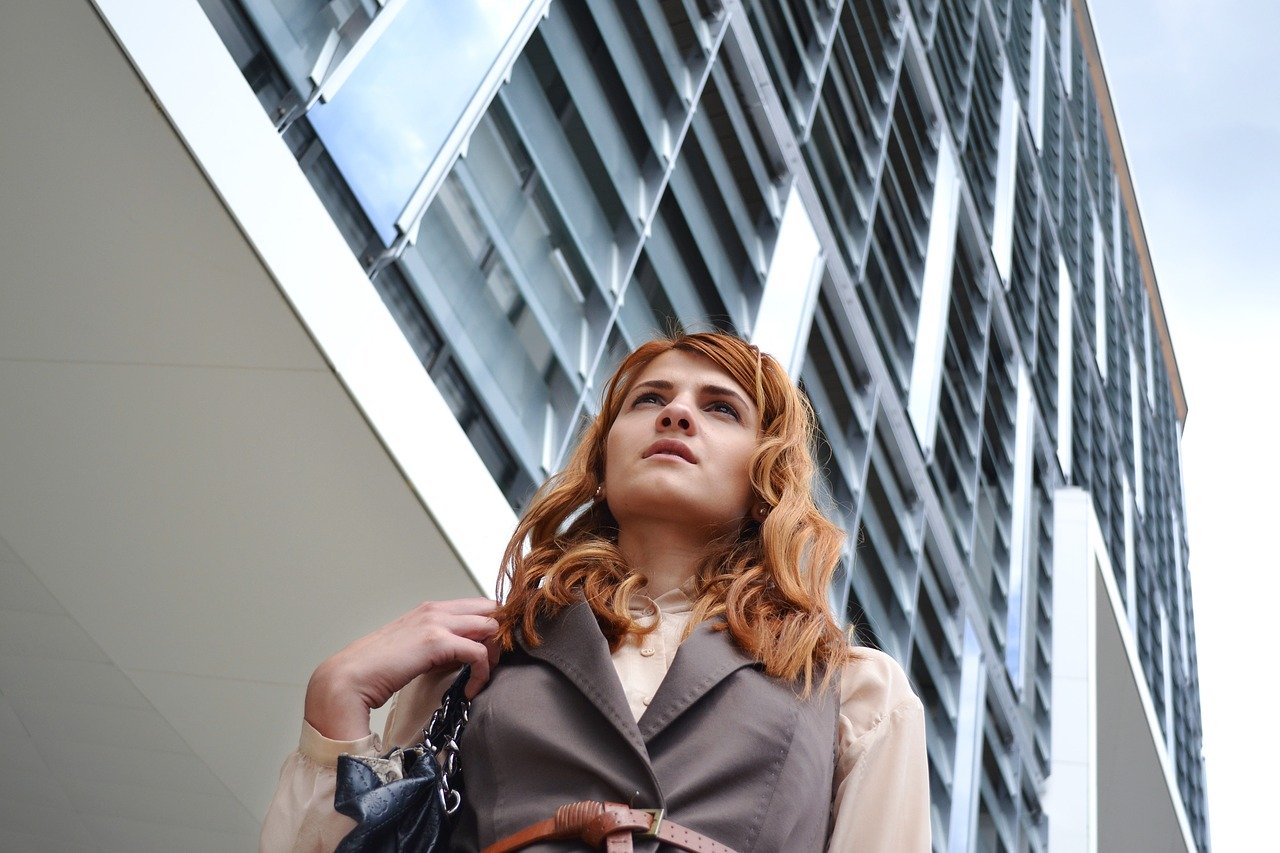 business woman portrait, outdoors business center, business